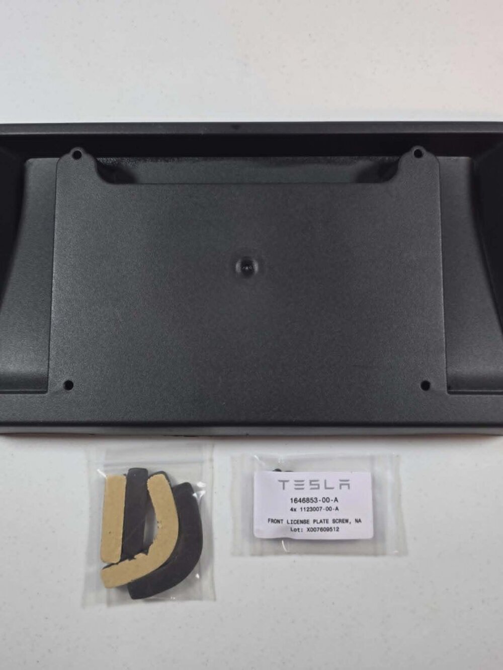 TESLA FRONT LICENSE PLATE HOLDER FRAME MODEL Y 2020 - 2024 OEM 1493090 NEW